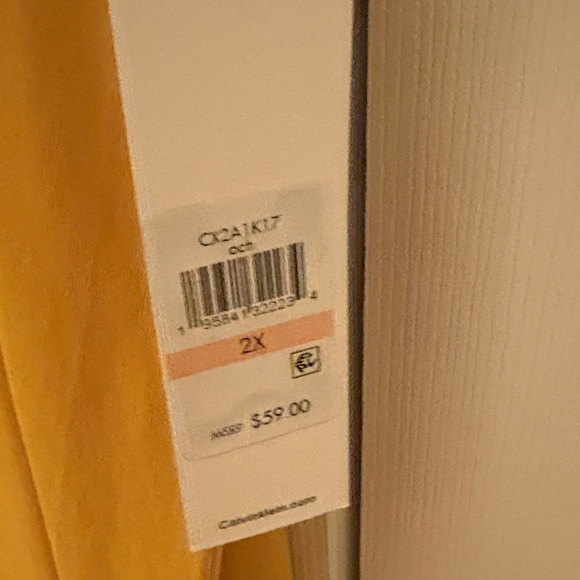 Calvin Klein Gold Logo Mustard Dress
NWT - Picture 5 of 7